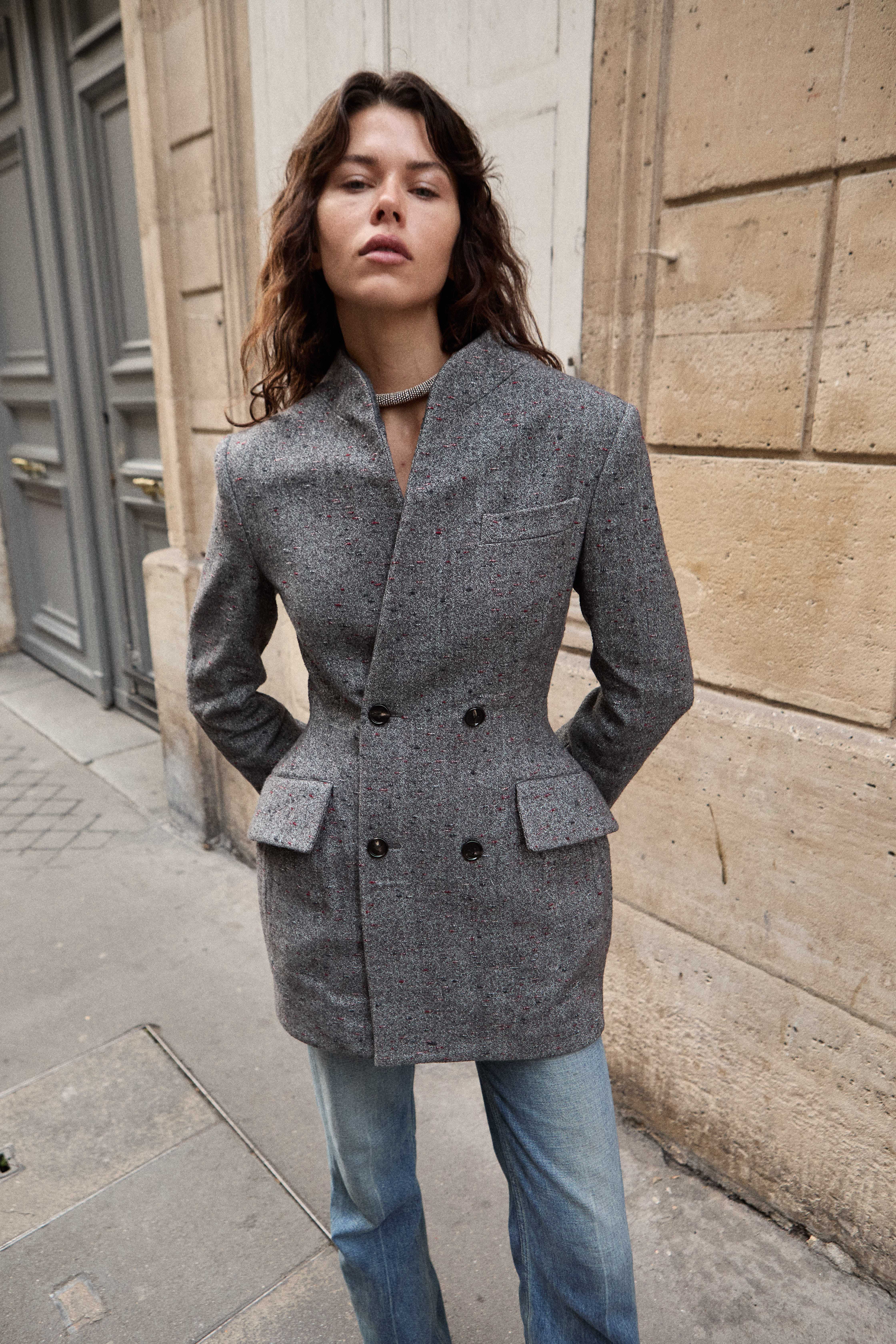 Model in grey tweed blazer Paris street