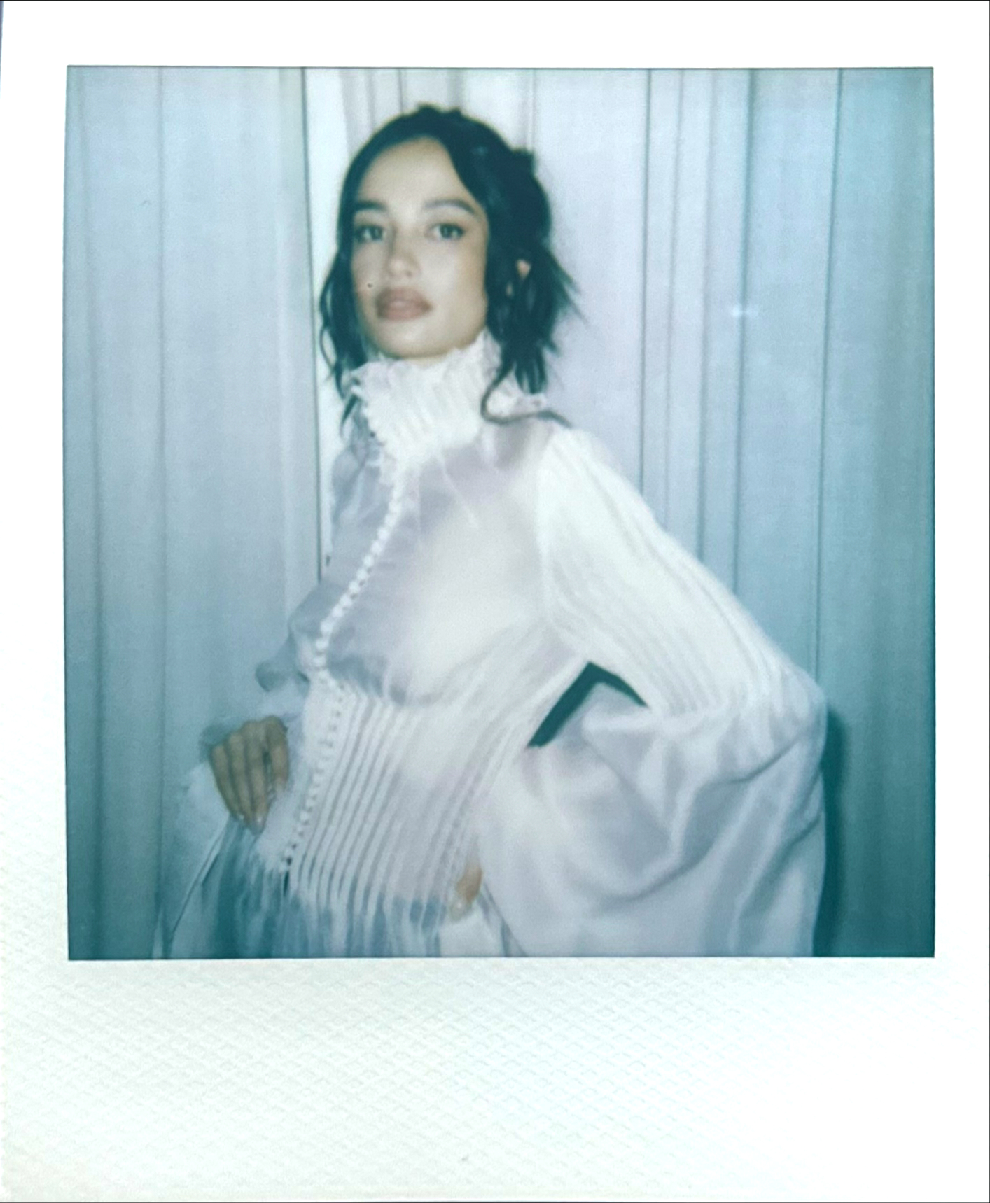 Polaroid model in white Victorian dress