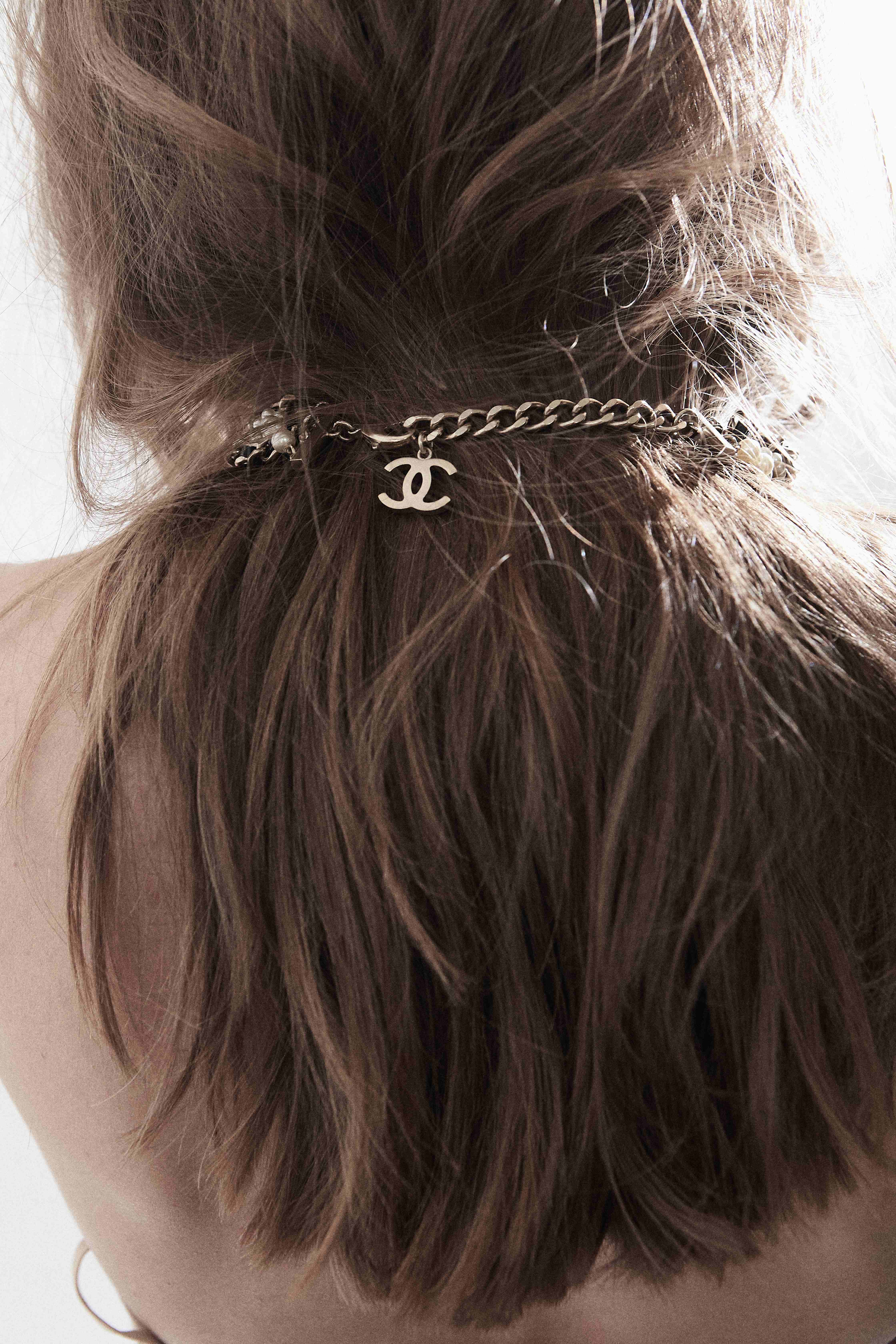Back of neck detail Chanel necklace clasp